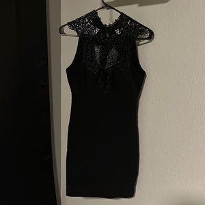 Black, sleek, mini dress. Classic. Little black dress.